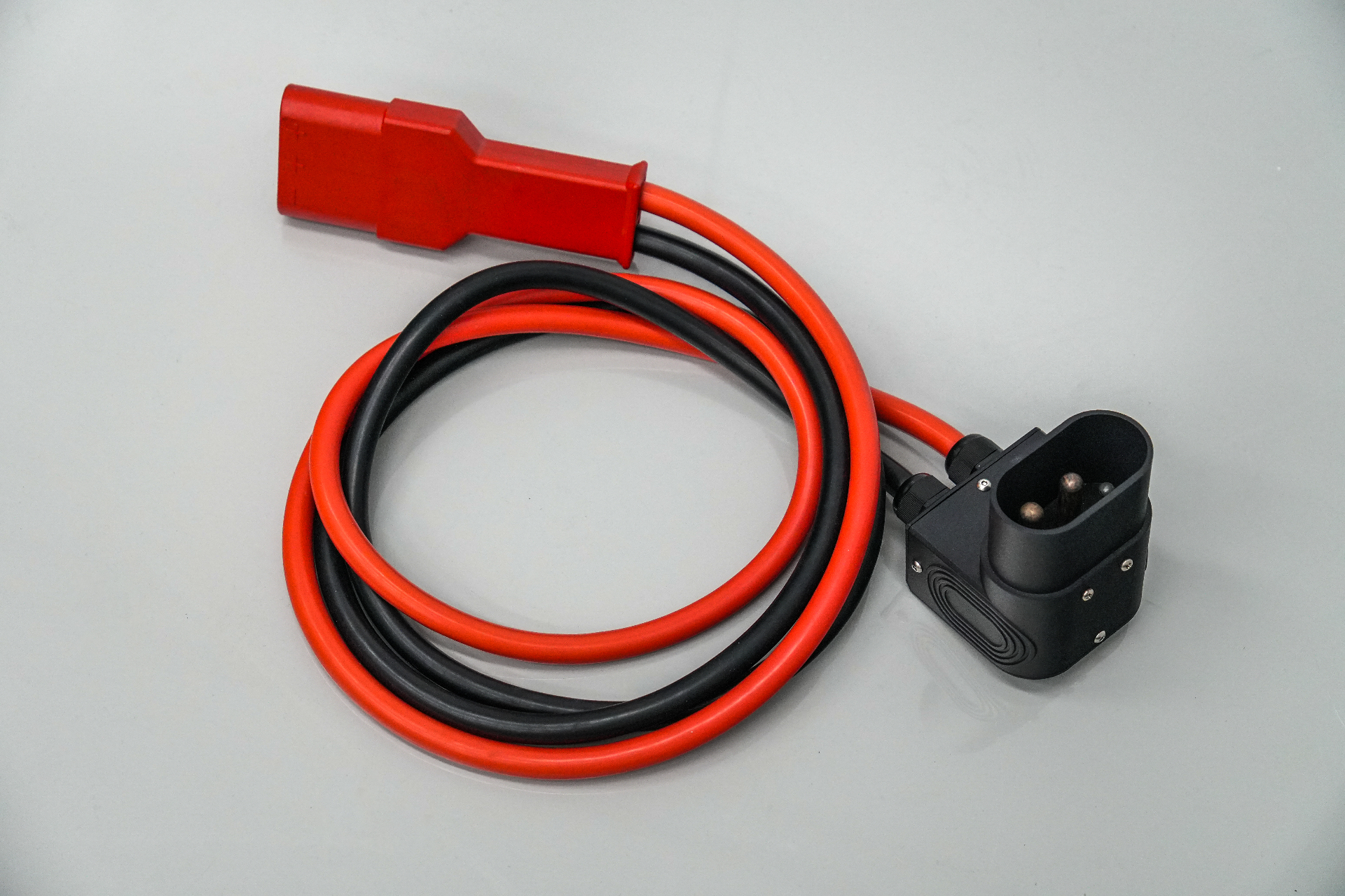 Aero-Jolt extension umbilical with red and black heavy-gauge leads and 3-pin output connector